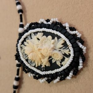 Cameo Pendant surrounded by Black and White Embroidered Sees B…